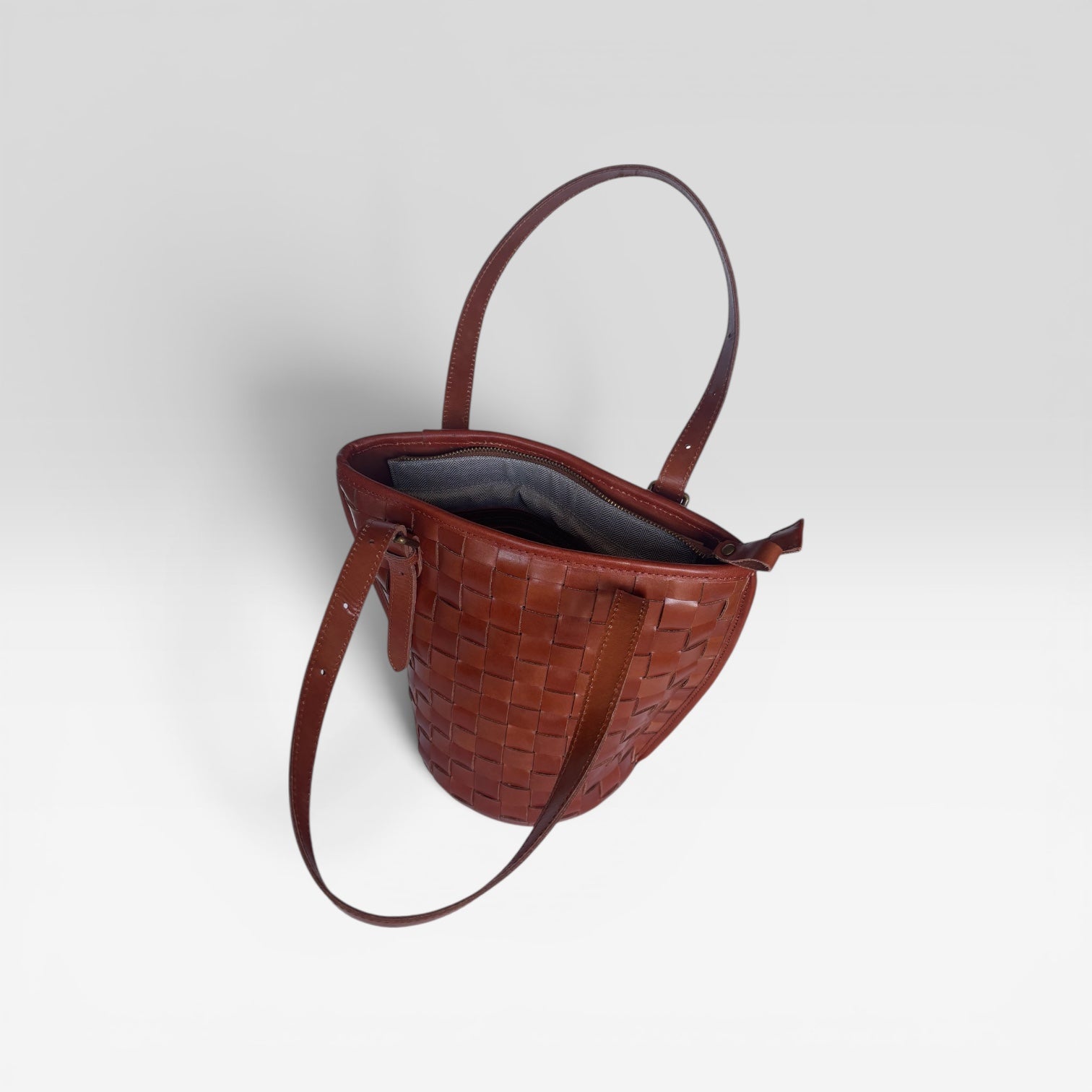 saddle leather crisscross barrel bag - tan