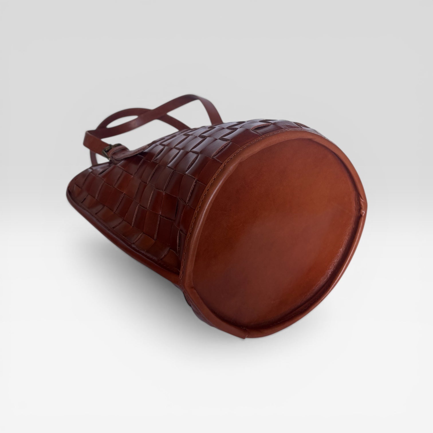 saddle leather crisscross barrel bag - tan