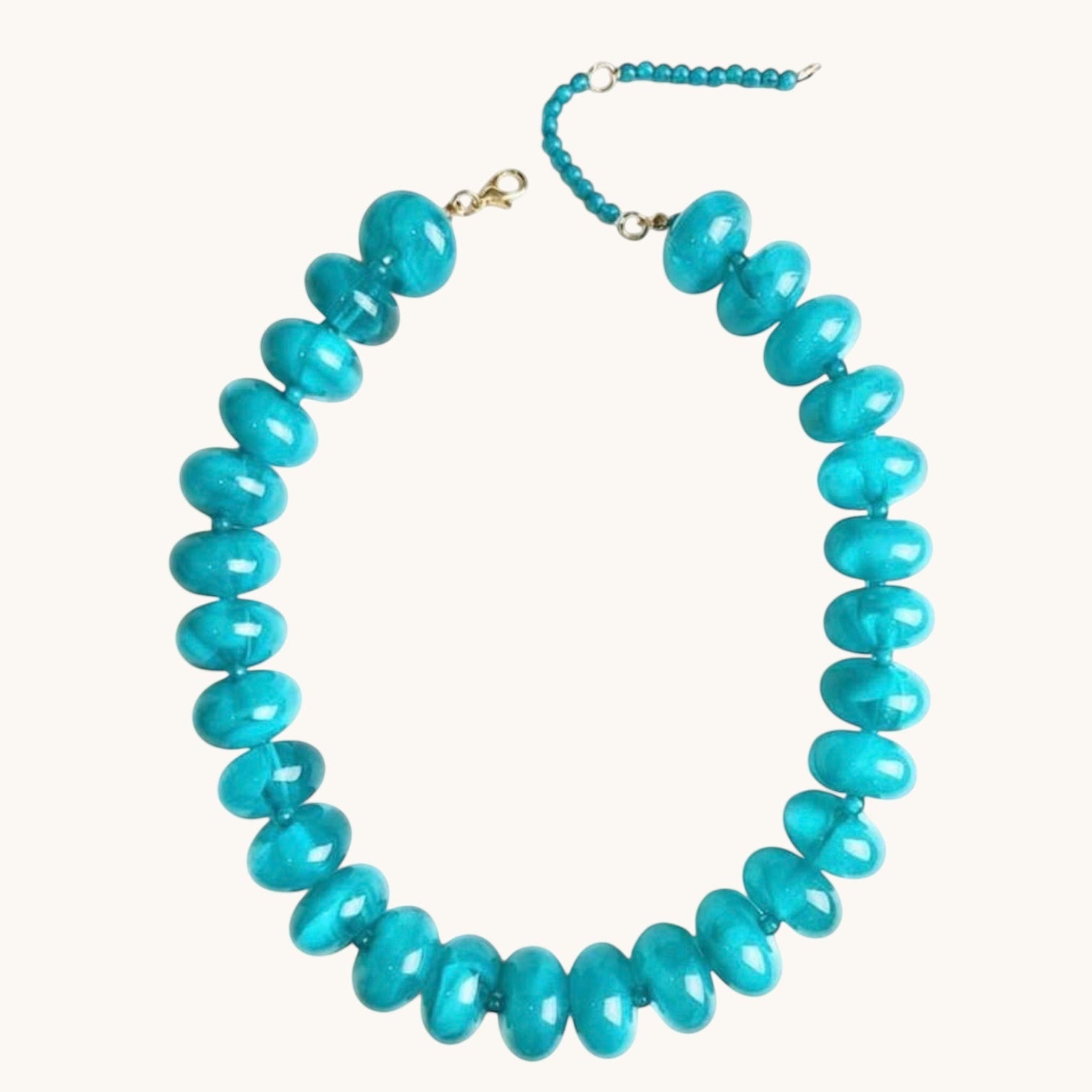 Home-Industry South Africa Soho glossy resin bead necklace in aqua blue, 50cm length, featuring smooth, rounded beads.