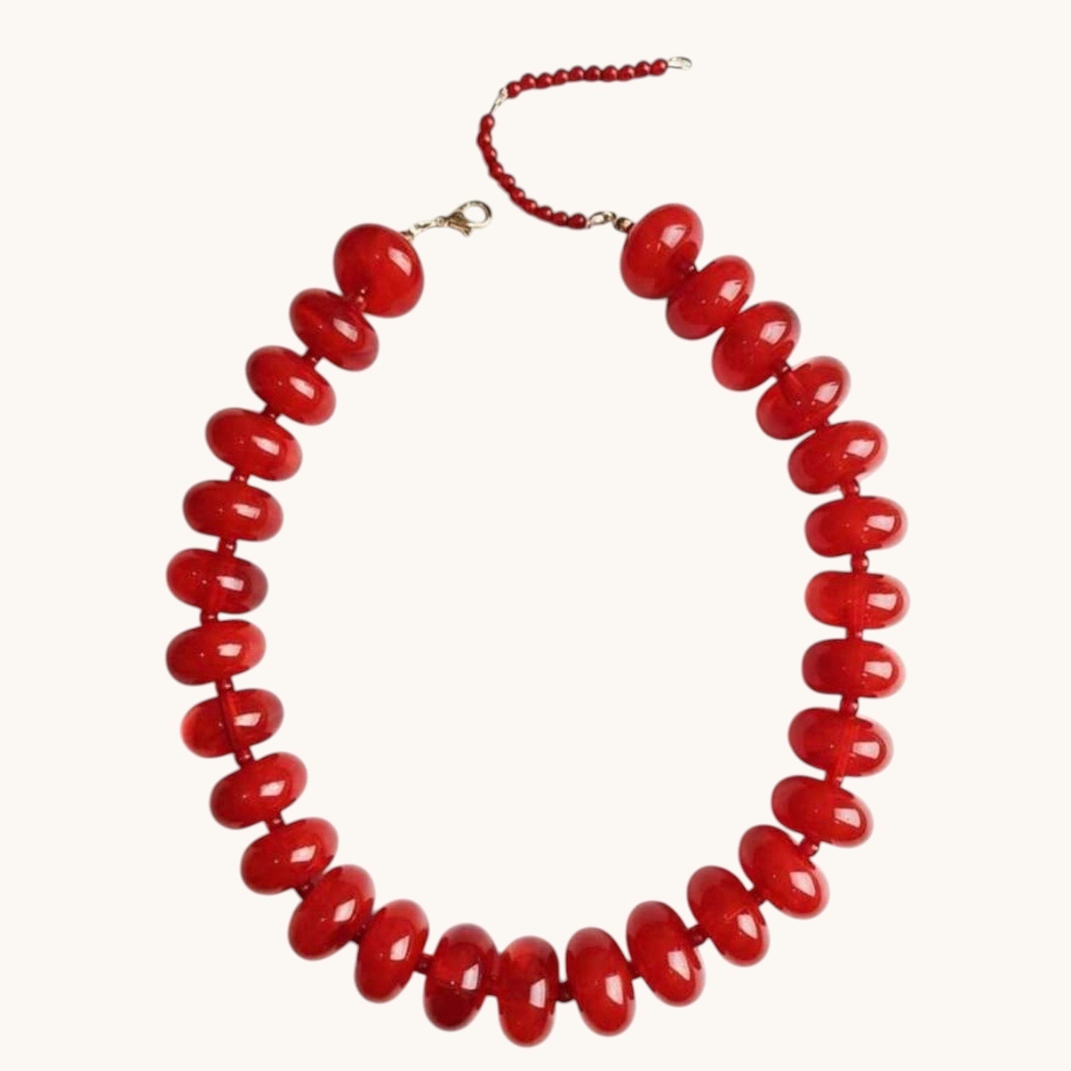 Home-Industry South Africa crimson red glossy resin bead necklace, 50cm length, with a lobster clasp closure.