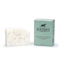 Home-Industry South Africa Africanis Kalahari Melon hard soap bar with chia seeds next to its light green box.