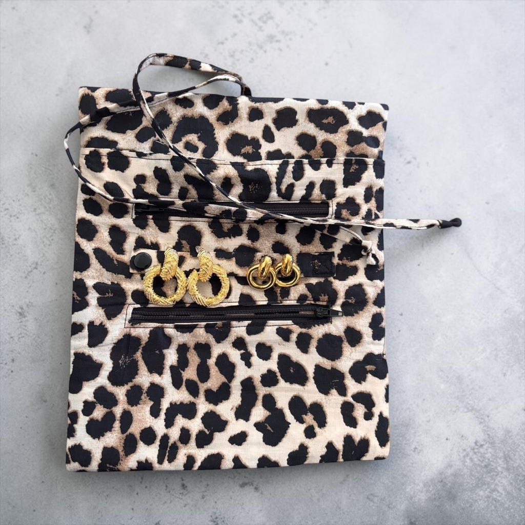 Home-Industry South Africa leopard print cotton jewellery roll with gold earrings in zippered compartments