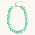 Home-Industry South Africa seafoam green flattened disc gemstone statement necklace with secure clasp.